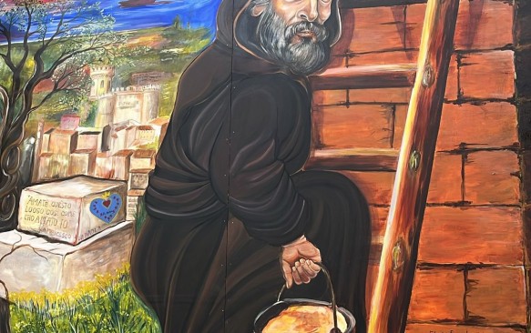 Corigliano. San Francesco versione operaio compare in un dipinto nel centro storico